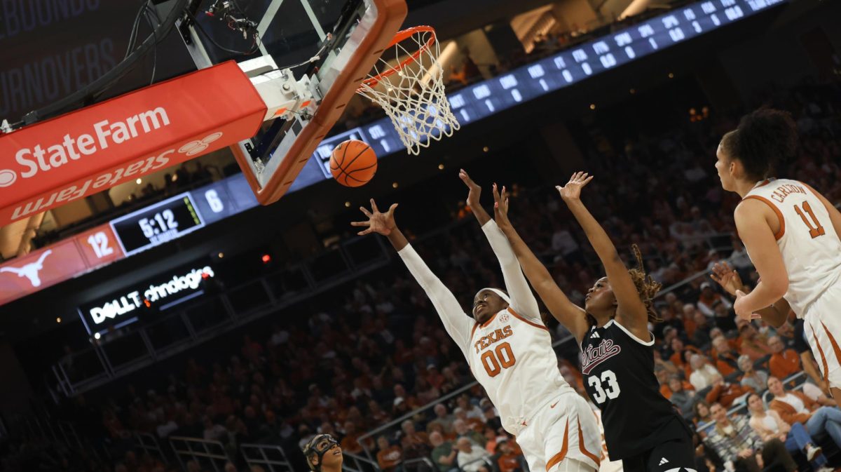 Senior center Kyla Oldacre shoots during Texas' game against Mississippi State at the Moody Center on Feb. 22.
