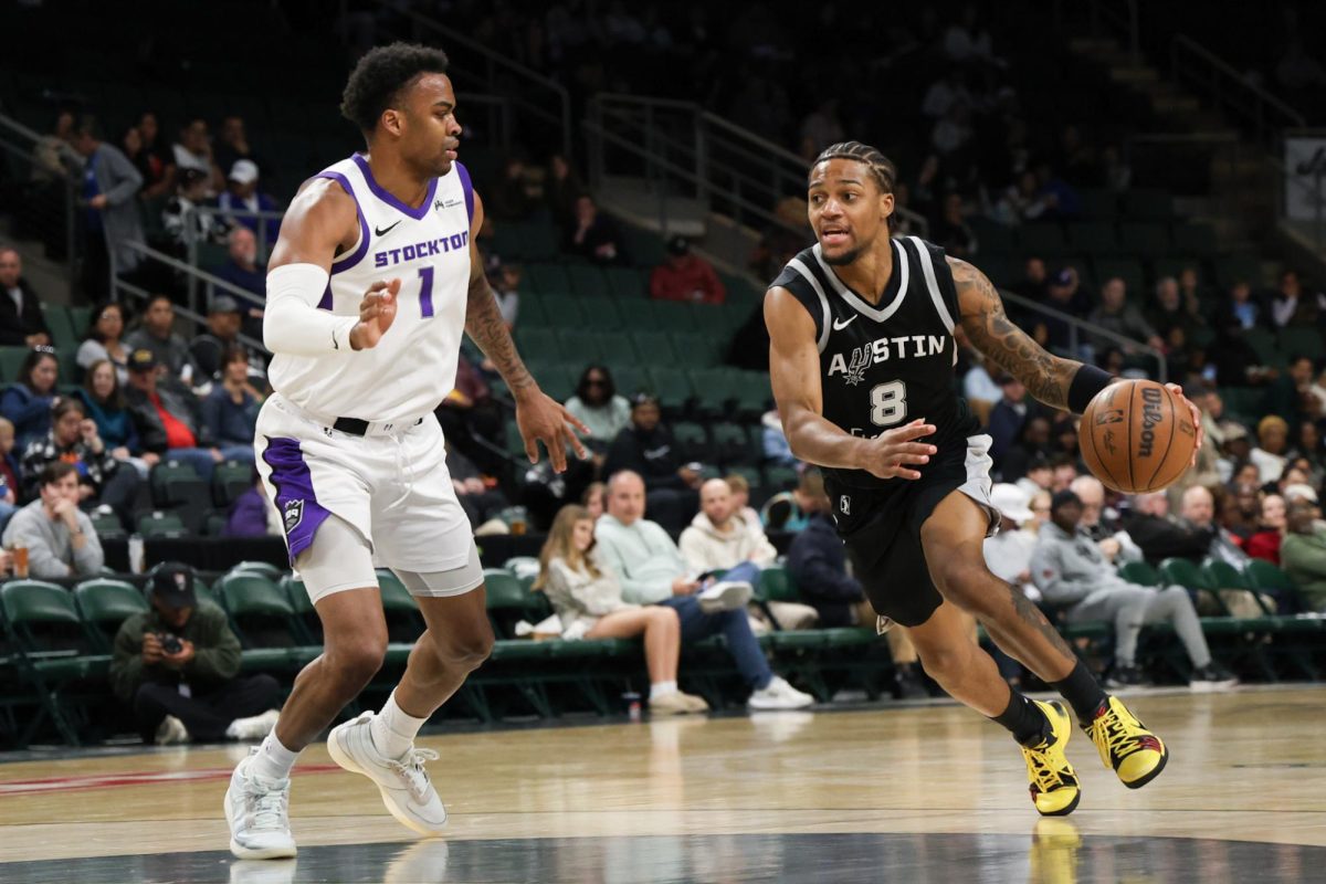 Guard Jayden Nunn dribbles around guard KJ Jones II during an Austin Spurs vs. Stockton Kings game in H-E-B Center at Cedar Park on Jan. 29. 