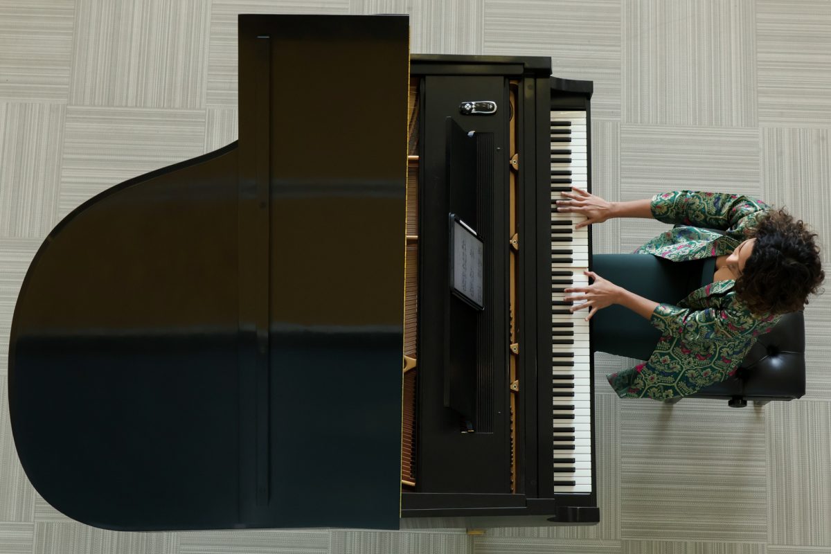 Chelsea de Souza performs at the Musical Memories event in the Norman Hackerman Building atrium on Friday, Jan. 30. De Souza presented her lecture-recital "The Silk Road," which features pieces influenced by exchanges between Western and Eastern musical traditions.