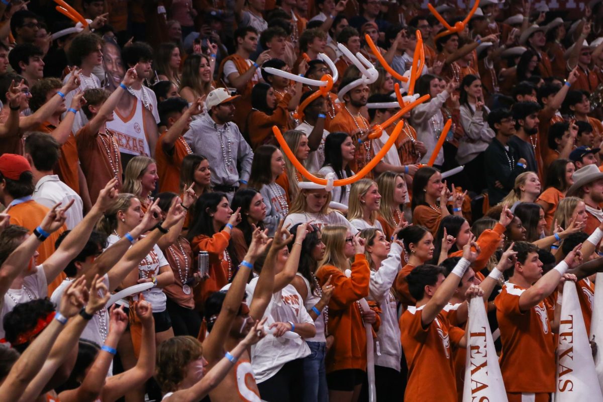 The University of Texas’ student section puts its “Hook ’em Horns” hand sign up on Tuesday, Feb. 17, 2026.