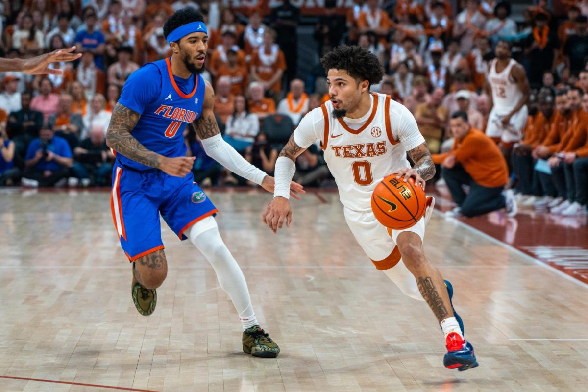 Senior guard Jordan Pope drives towards the net in a game against Florida at the Moody Center on Feb. 25, 2026. 