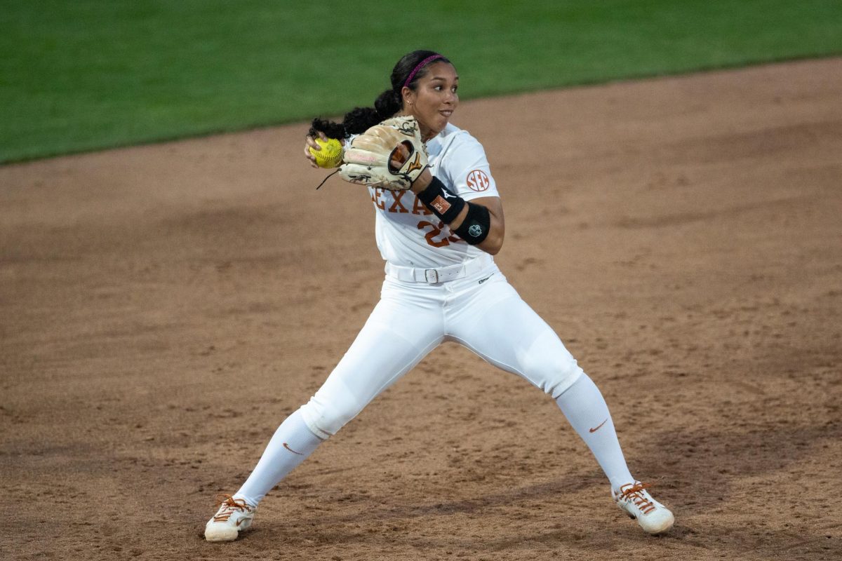 Junior infielder Viviana Martinez throws to 1st base against Prairie View A&M University on Feb. 28.