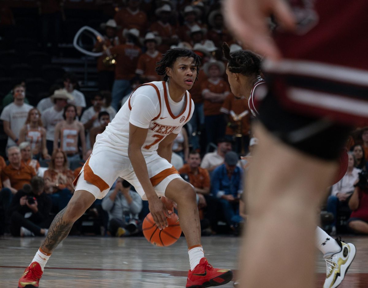Texas guard Simeon Wilcher with possession of the ball during the Texas v. Carolina game on Tuesday, Feb. 3.