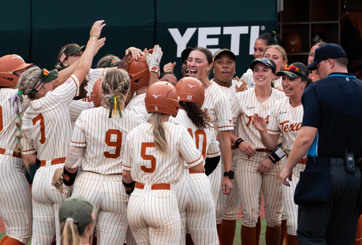 Texas softball players celebrate as the game ends with a grand slam by Reese Atwood at Texas' game against Louisiana State University on April 17, 2025.