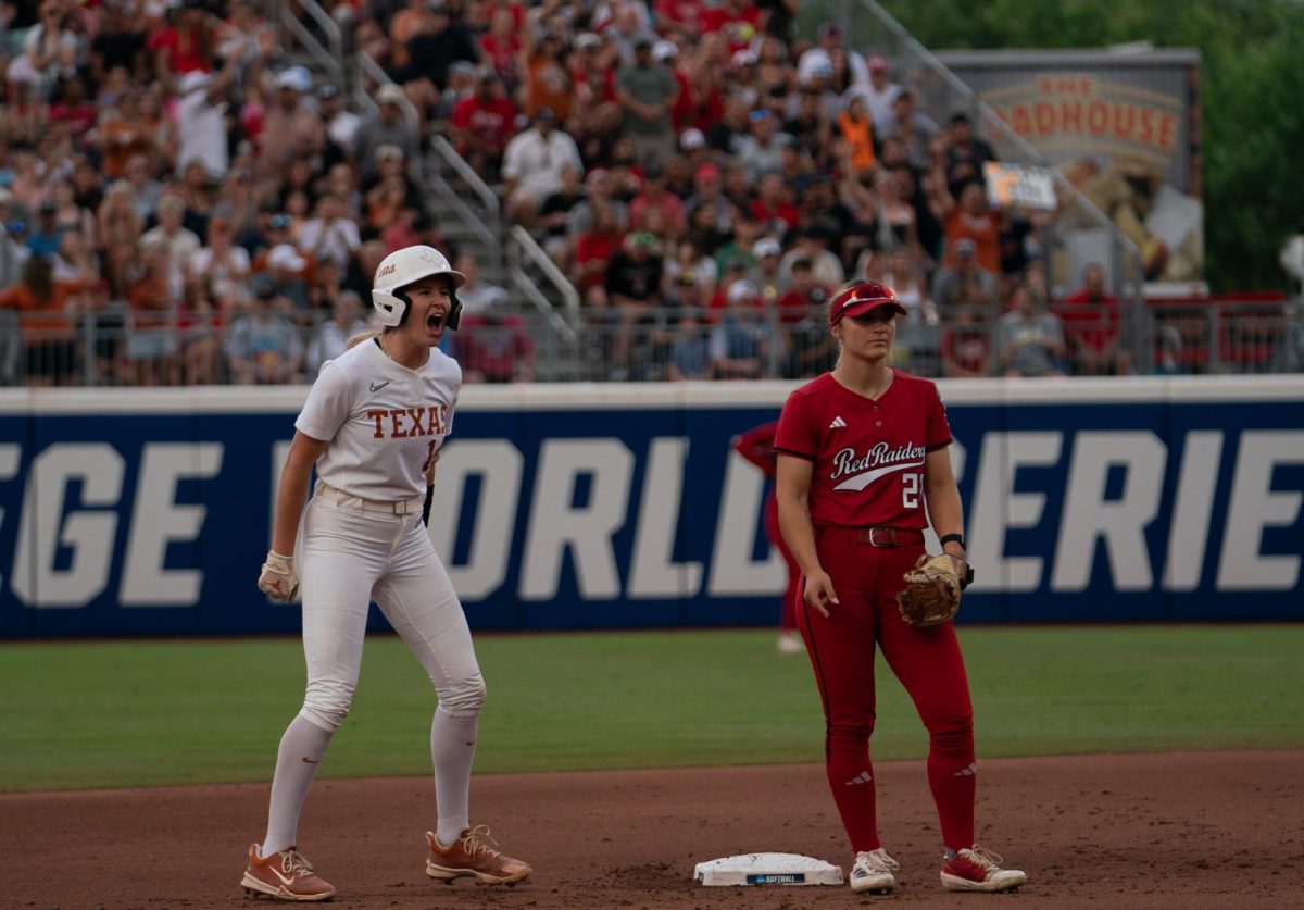 Junior Reese Atwood celebrates after hitting a double during the third game of the Women's College World Series against the Texas Tech Red Raiders on June 6, 2025. 