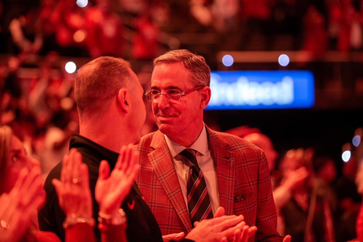 Texas Athletics Director Chris Del Conte sits courtside with Texas Football head coach Steve Sarkisian at the Texas women's basketball game against LSU on Feb. 5, 2026.