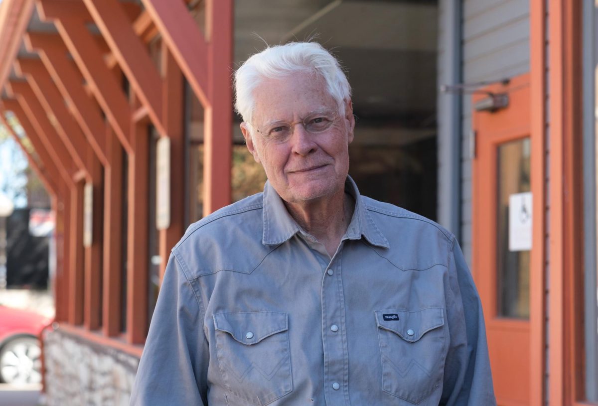 "Dark Texas" author Charles Petrie Jr. poses for a portrait at Kerbey Lane Cafe on Feb. 6.