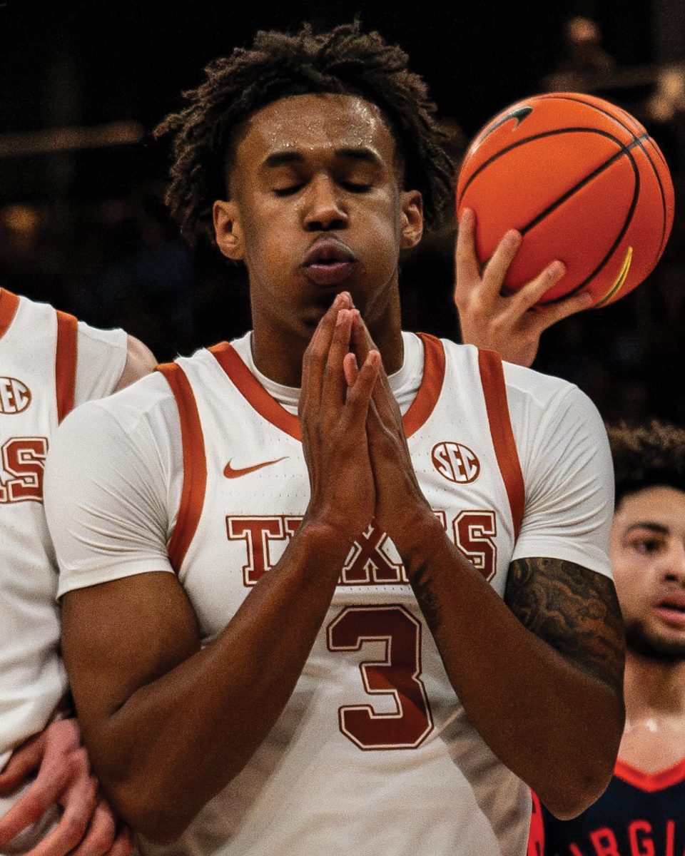Junior Dailyn Swain reacts to a foul called during Texas' game against Virginia on Wednesday, Dec. 3, 2025.