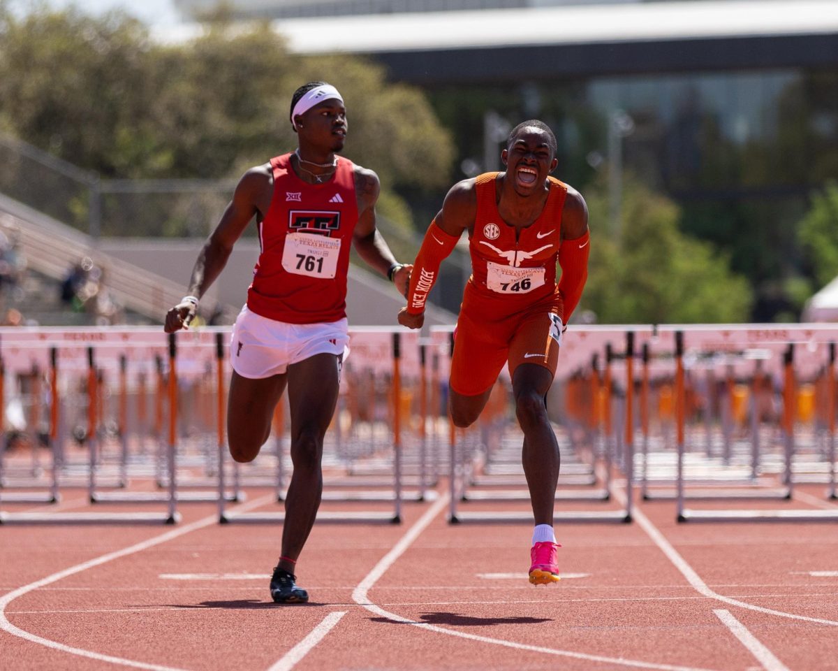 Kendrick Smallwood celebrates after he wins the 110-meter hurdles final on March 29, 2025. Smallwood broke the Texas program record with his time of 13.07 seconds. 