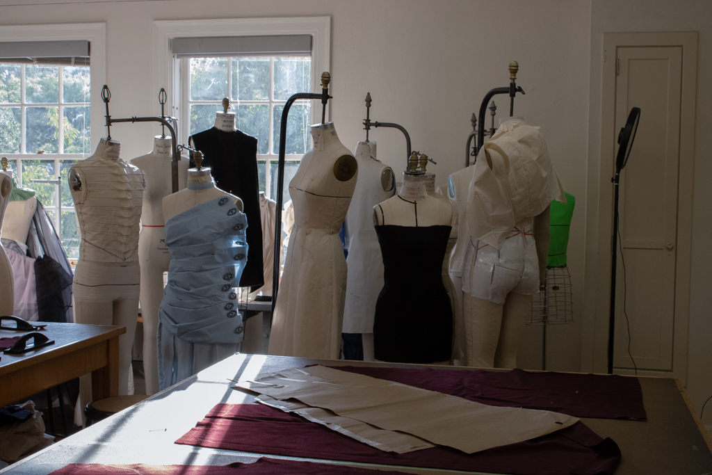Multiple dress forms covered in toiling and incomplete designs sit in the Textiles and Apparel labs inside of Gearing Hall on March 26. Students in the TXA capstone have been preparing their garments for the upcoming fashion show on April 26th.