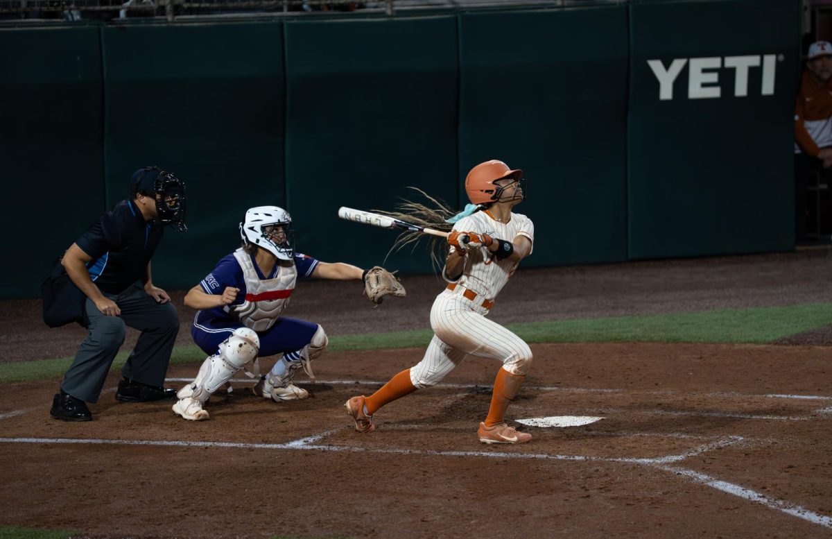 Junior outfielder Kayden Henry swings at a pitch against Abilene Christian University on Thursday, Feb. 12.