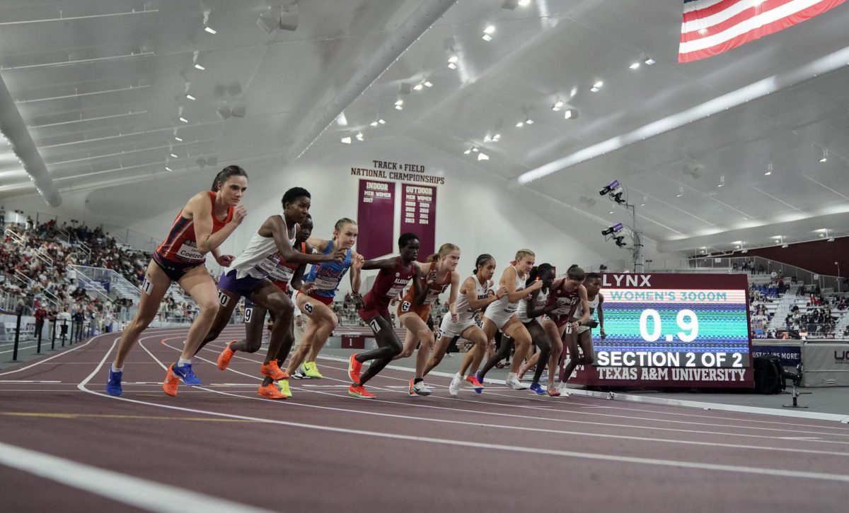 Junior Eva Jess (6) fights for lane positioning in the 3000-meter race at the Southeastern Conference Indoor Track Championships on March 1, 2025.