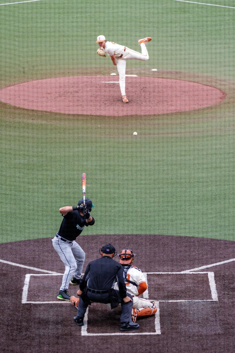 Sophomore pitcher Dylan Volantis pitches at Texas' game against USC Upstate at Disch-Falk Field on March 8.