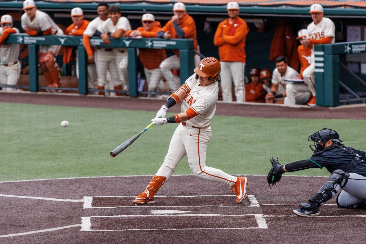 Graduate infielder Josh Livingston hits a grand slam at Texas' game against USC Upstate at Disch-Falk Field on March 8. Livingston hit a grand slam in the sixth inning and a two-run homer in the eighth to end the game via the 10-run mercy rule.