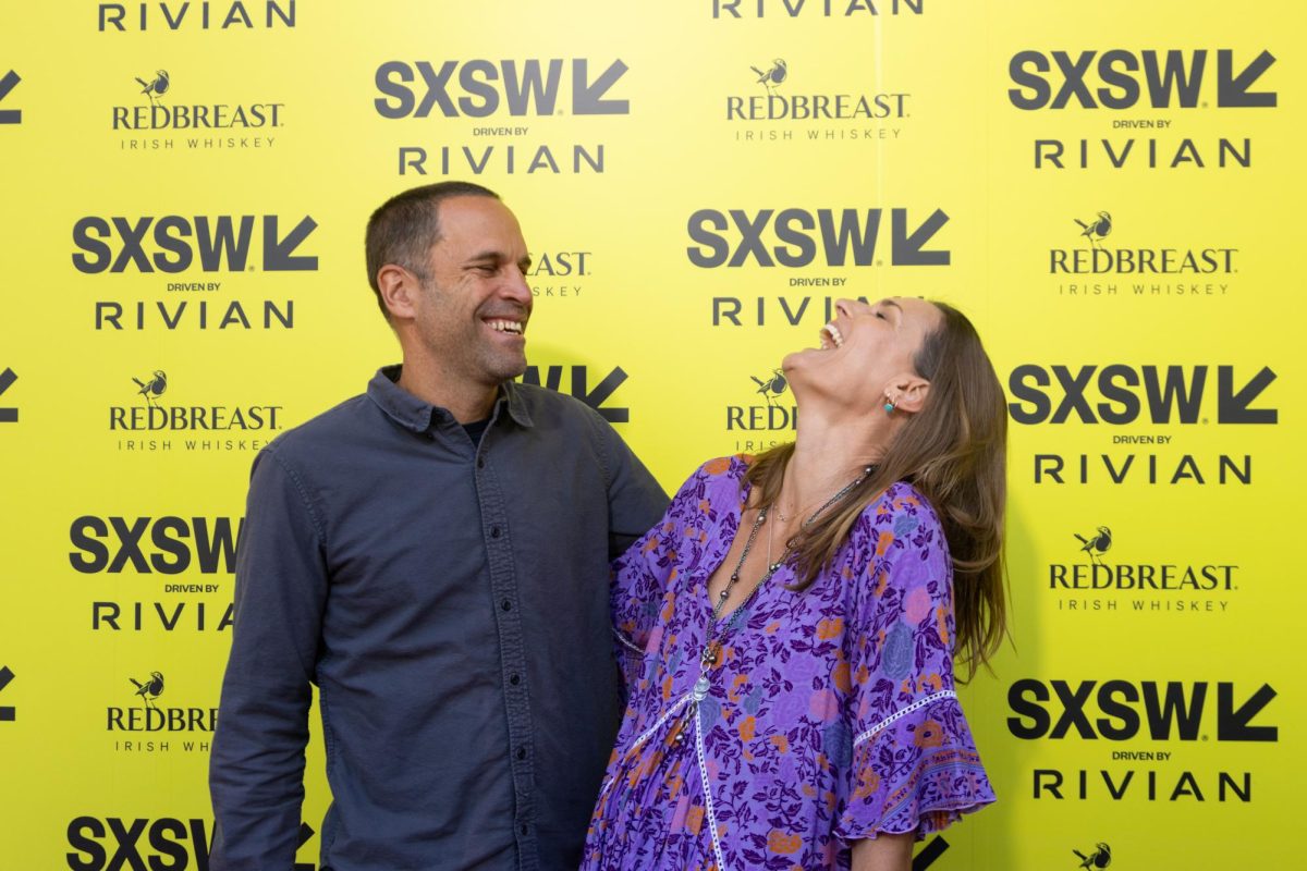Jack Johnson and Kim Johnson share a laugh on the the Surfilmusic red carpet at Paramount Theater on Friday, March 13.