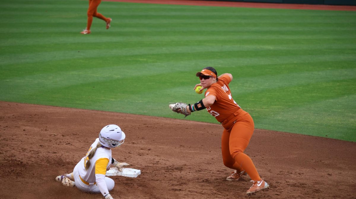 Sophomore shortstop Katie Stewart throws the ball to first after forcing a runner out at second during Texas' matchup against LSU at Red & Charline McCombs Field on April 18, 2025.
