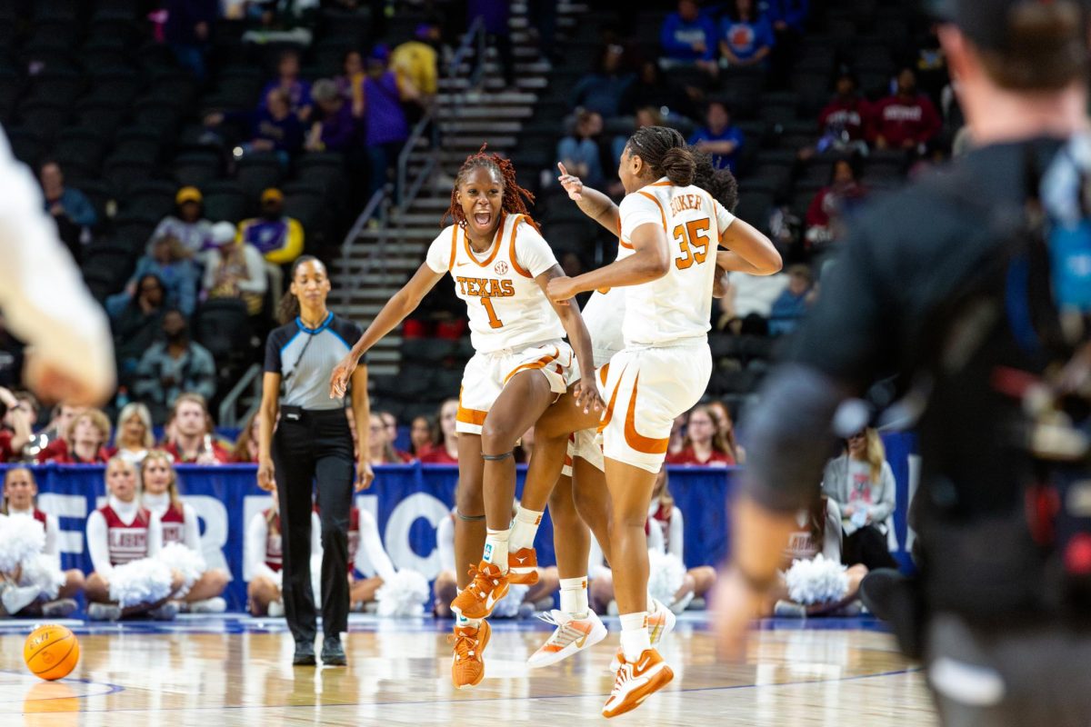 Sophomore guard Bryanna Preston, junior forward Madison Booker and senior forward Rori Harmon celebrate a successful first half of the game against Alabama during the Southeastern Conference Championship Tournament in Greenville, South Carolina on Friday, Mar. 6.