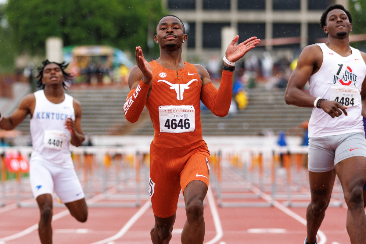 Texas senior Kendrick Smallwood celebrates after finishing first in the men’s 110m hurdles on April 4, 2026.