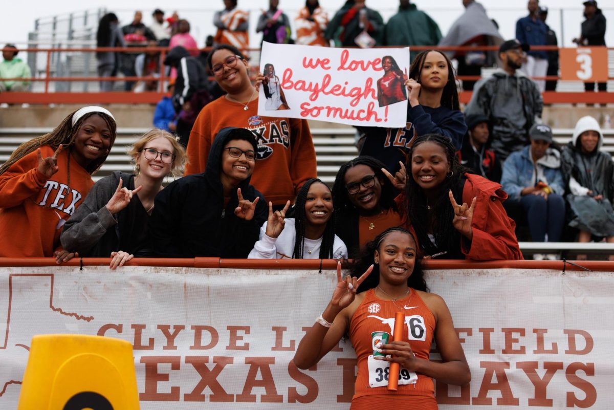 Texas freshman Bayleigh Minor poses with fans after placing first in the Sanya-Richards Ross women’s 4x400m invitational on April 4, 2026.