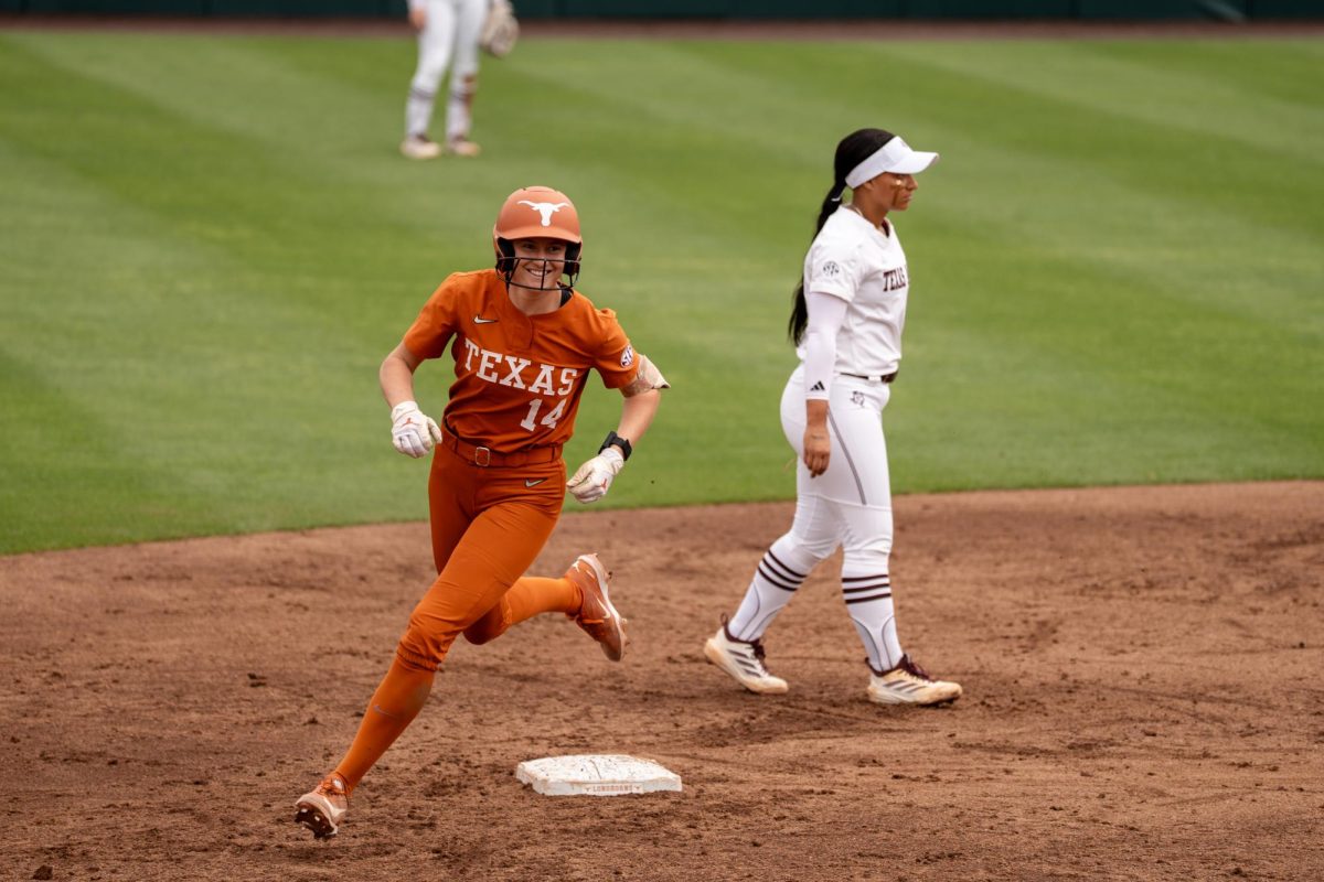 Senior catcher Reese Atwood runs the bases after a home run during a 3-2 home win against Texas A&M on March 28.