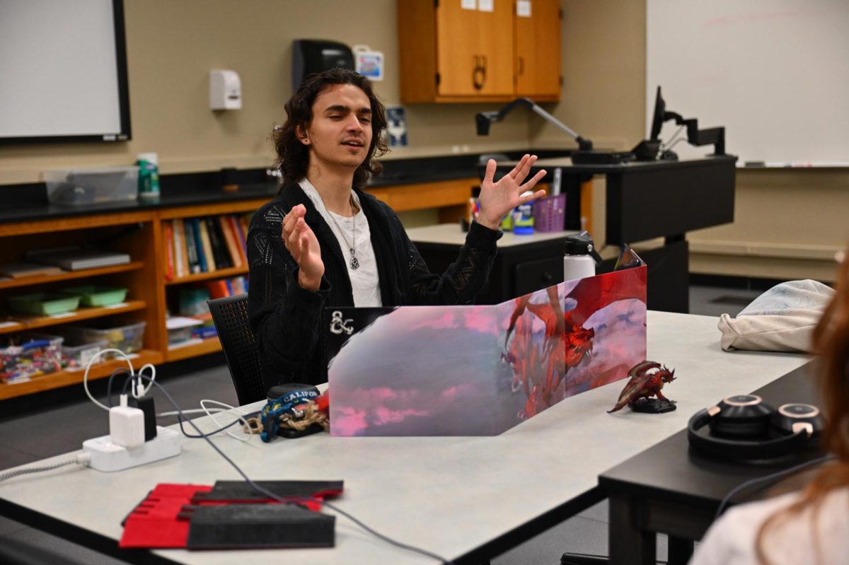Dungeon Master Ryan Read leads the players through a Dungeons and Dragons campaign in the George I. Sanchez Building at UT on Wednesday, April 1.