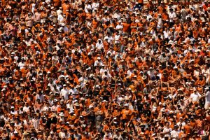 Fans dressed in burnt orange and white spectate UT Football's game against Rice on September 2, 2023.
