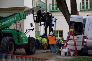 The Cesar Chavez statue on UT's West Mall is taken down Thursday, June 4. Chavez, the late co-founder of Union Farm Workers and a political activist, drew wide condemnation after a New York Times investigation alleged he sexually abused multiple women in UFW.