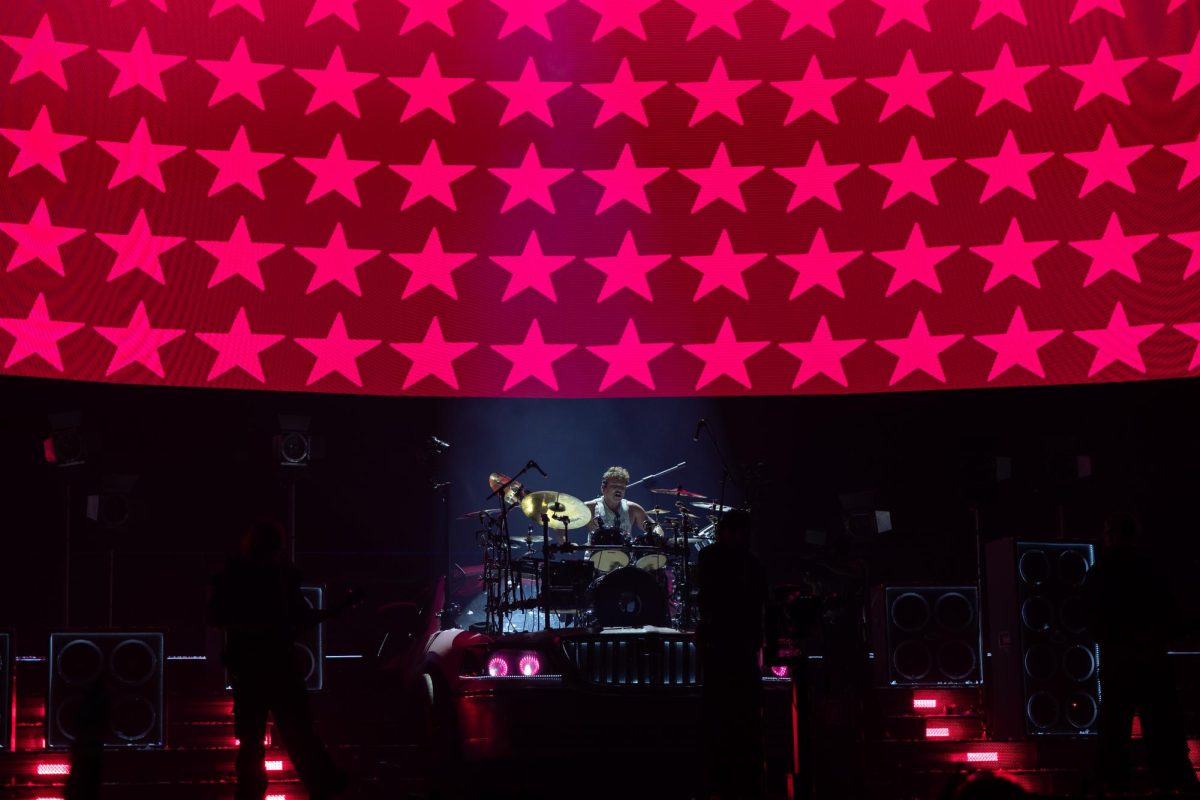Drummer Ashton Irwin performs a drum solo during 5SOS's tour stop at Moody Center in Austin on June 21.