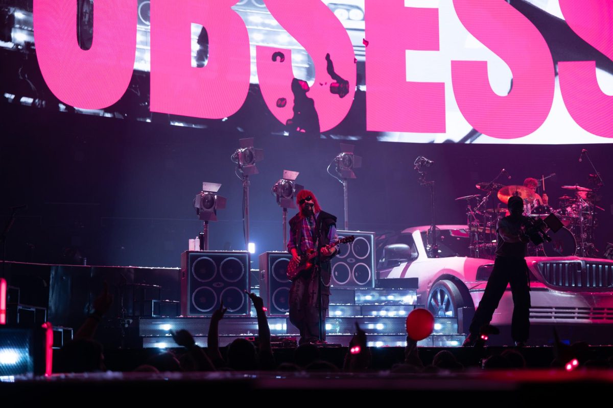 Guitarist Michael Clifford performs the band's song, "No. 1 Obsession," at Moody Center in Austin on June 21.