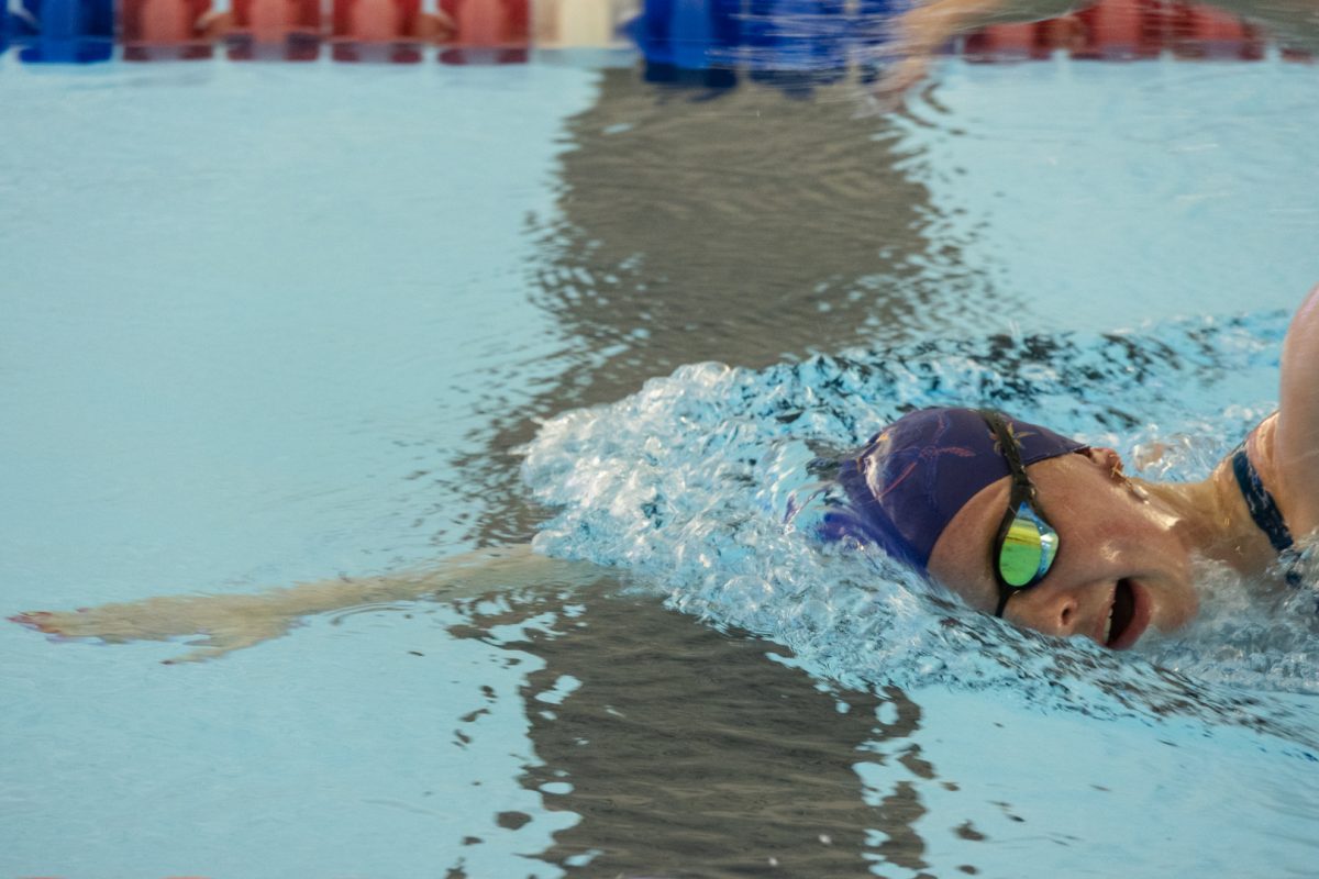 Lydia Jacoby trains at Eanes Aquatics Center on April 3.