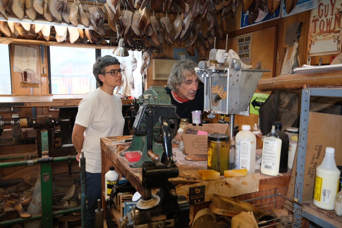 Lee Miller and Jule Schumacher alter a last inside the Texas Traditions workshop on March 26. 