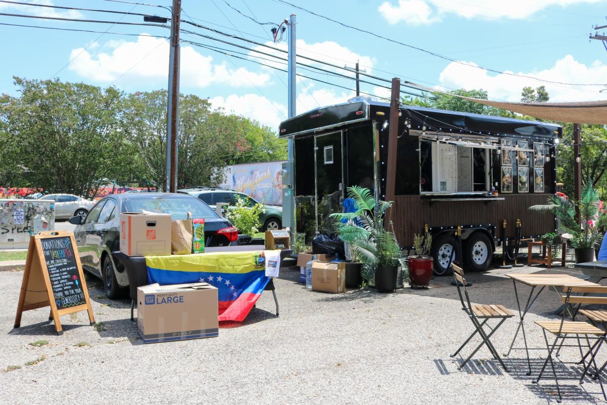 Vaco House hosts a donations drop-off for Venezuelan earthquake aid right outside the doors of their food truck off Avenue H on Friday, July 3.