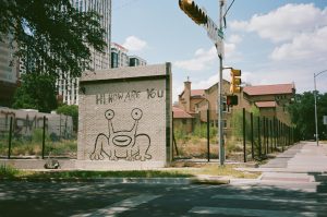 The "Hi, How Are You" mural is pictured on Monday, July 6. The wall was previously part of Sound Exchange, an independent record store and live music venue that closed in the early 2000s.